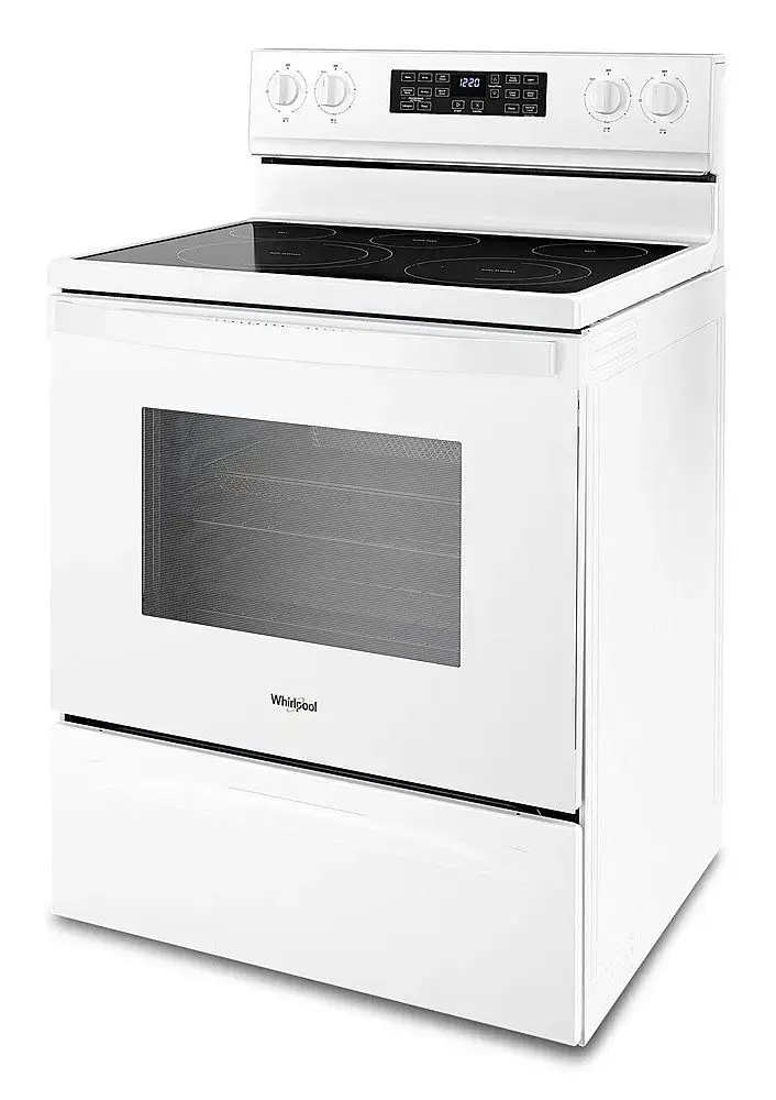 The image features a white stove with a digital clock displaying the time of 12:20. The clock is located in the middle of the stove, and it is surrounded by various buttons and knobs, which are likely used for controlling the oven and other functions. The stove is a modern appliance that likely offers a range of features and settings to assist with cooking and baking tasks.