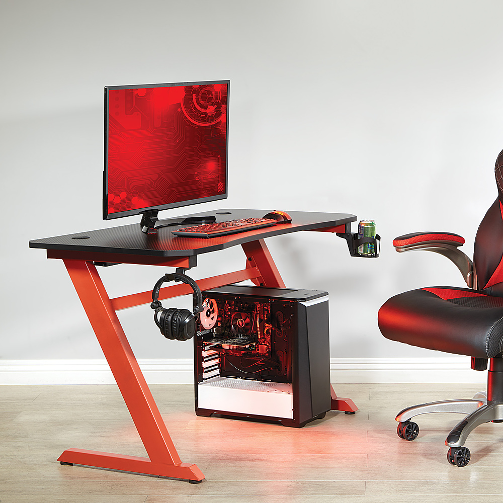 Left View: OSP Home Furnishings - Ghost Battlestation Gaming Desk  in Matte Black Top and Red Legs - Black/Red