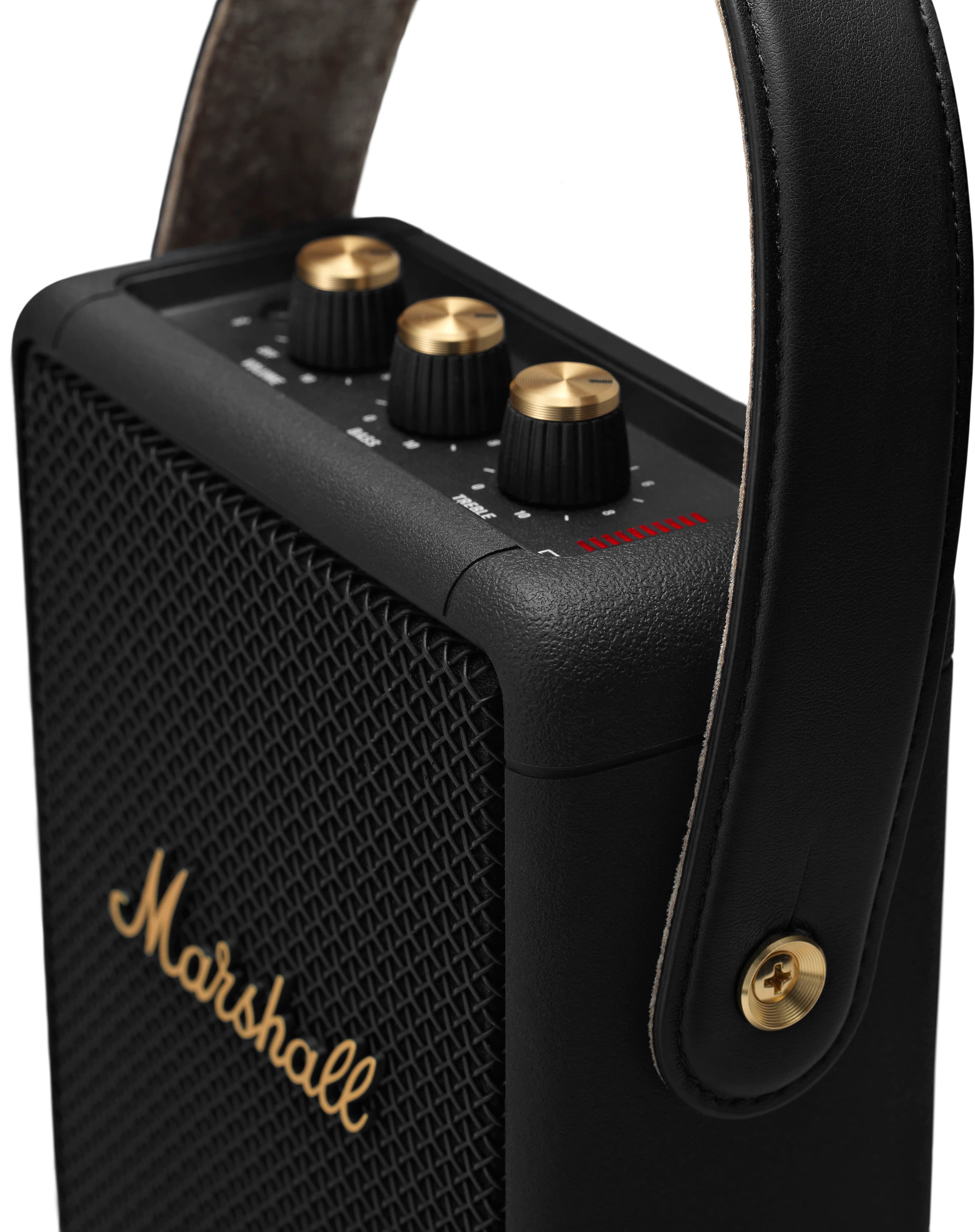 A small Marshall speaker with a black leather strap.