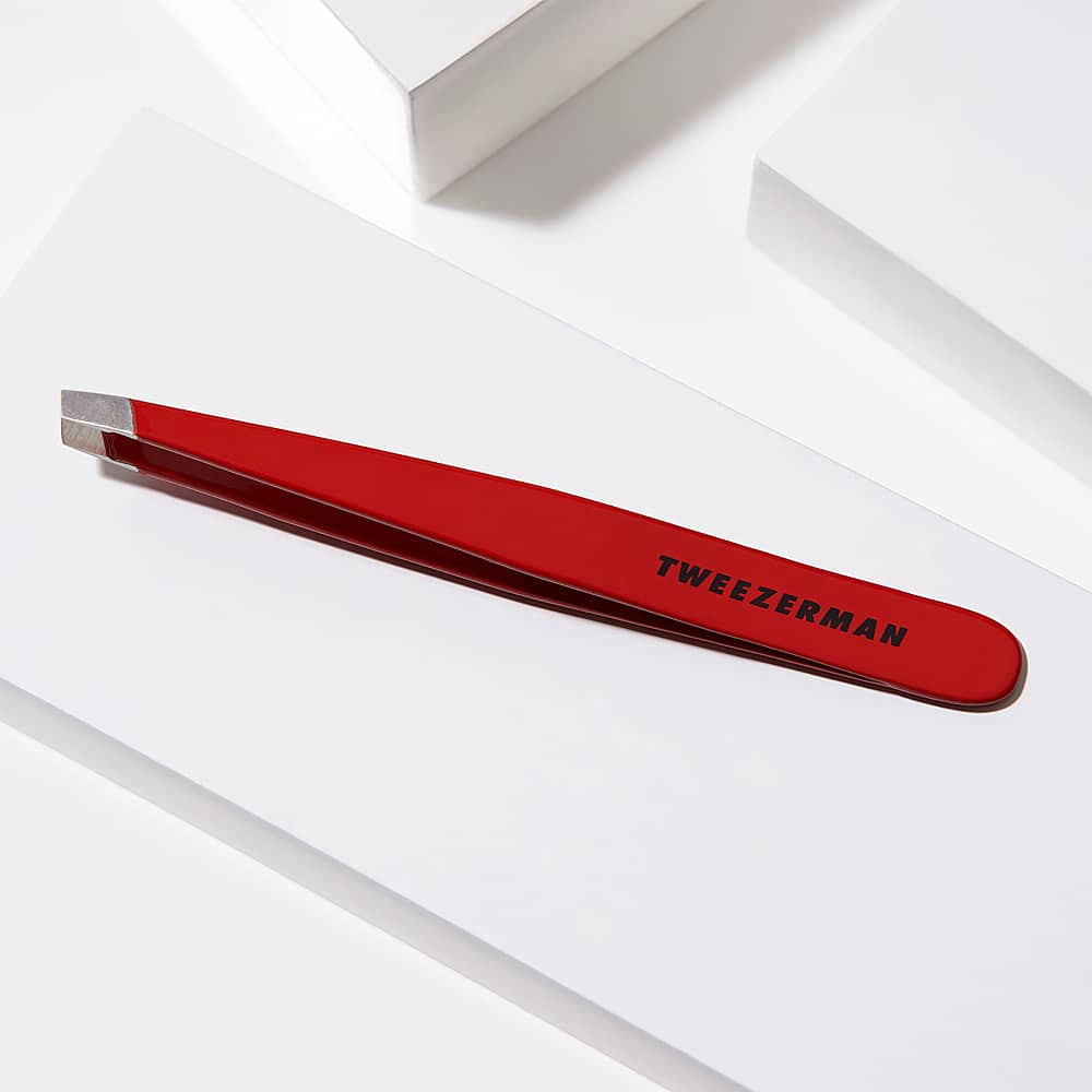 Left View: Tweezerman - Slant Tweezer - Signature Red