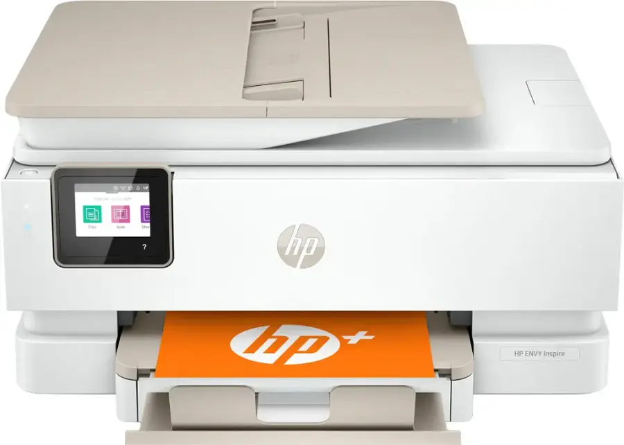 The image features a white HP printer with a purple sign that reads "3 months 3 free ink." The printer is placed on a white background, and the sign is prominently displayed in front of the printer.