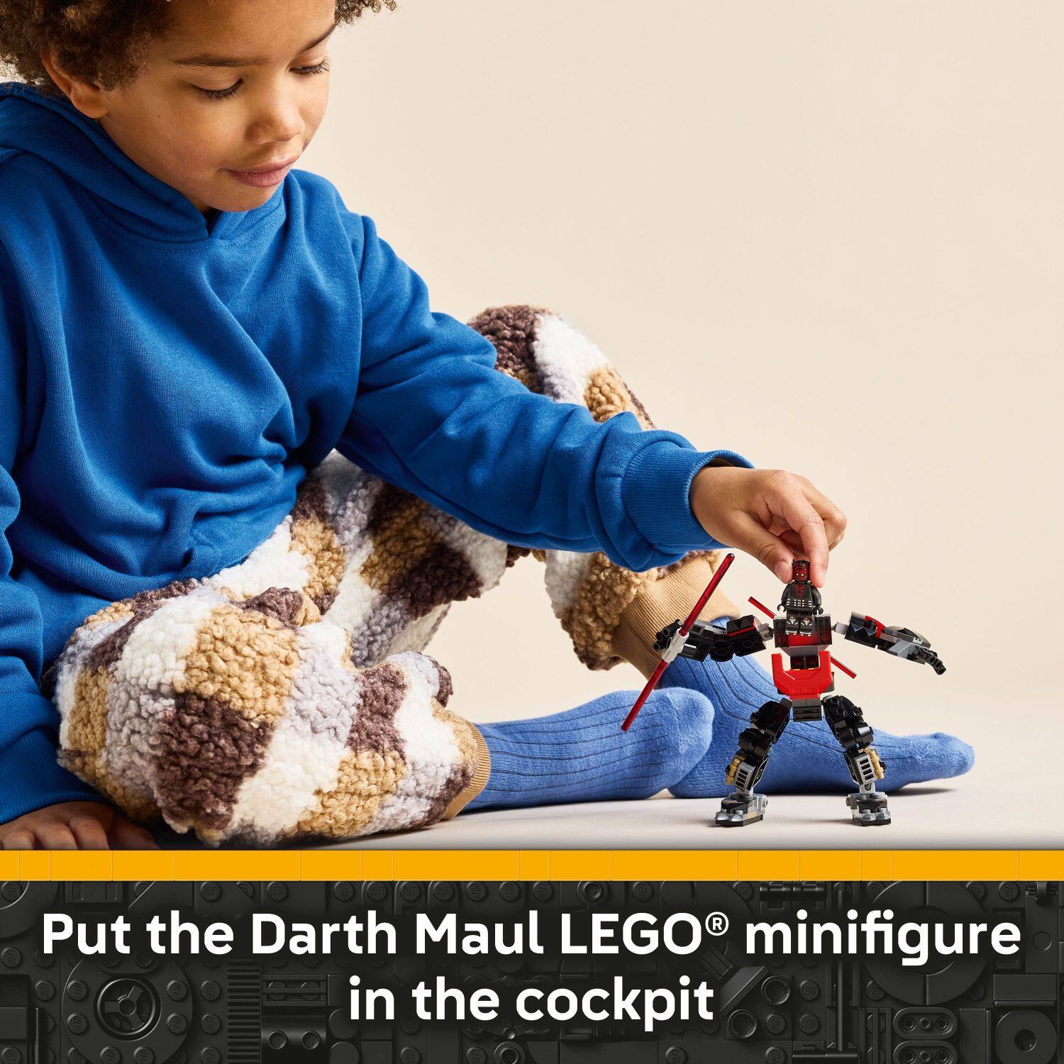 Put the Darth Maul LEGO minifigure in the cockpit.