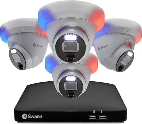 The image features four Swann security cameras mounted on a black stand. The cameras are positioned at different angles, providing a comprehensive view of the area they are monitoring. The cameras are equipped with LED lights, which illuminate the area and enhance their visibility. The Swann brand is prominently displayed on each camera, emphasizing their quality and reliability.