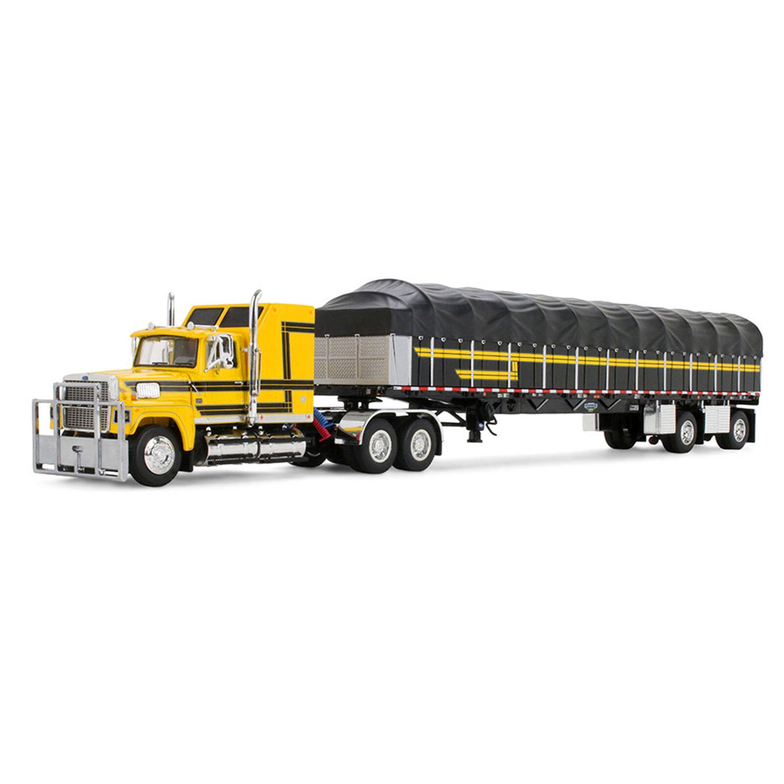 Alt View 1. First Gear - Ford LTL 9000 with 60" Aerodyne Sleeper & 53' Wilson Roadbrute Trailer w/Wagon Yellow w/Black 1/64 Model by First Gear.