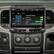 The image features a car's dashboard with a display screen showing various settings. The largest text reads "Advanced Settings," and the following text is as follows:
Loudness: ON
Subwoofer: ON
Center Phase: Sub. Level MIN 0* 180* 15 MAX II 2
In addition to these settings, there are buttons for PUSH TO PULL and PUSH OFF TOW HAUL.