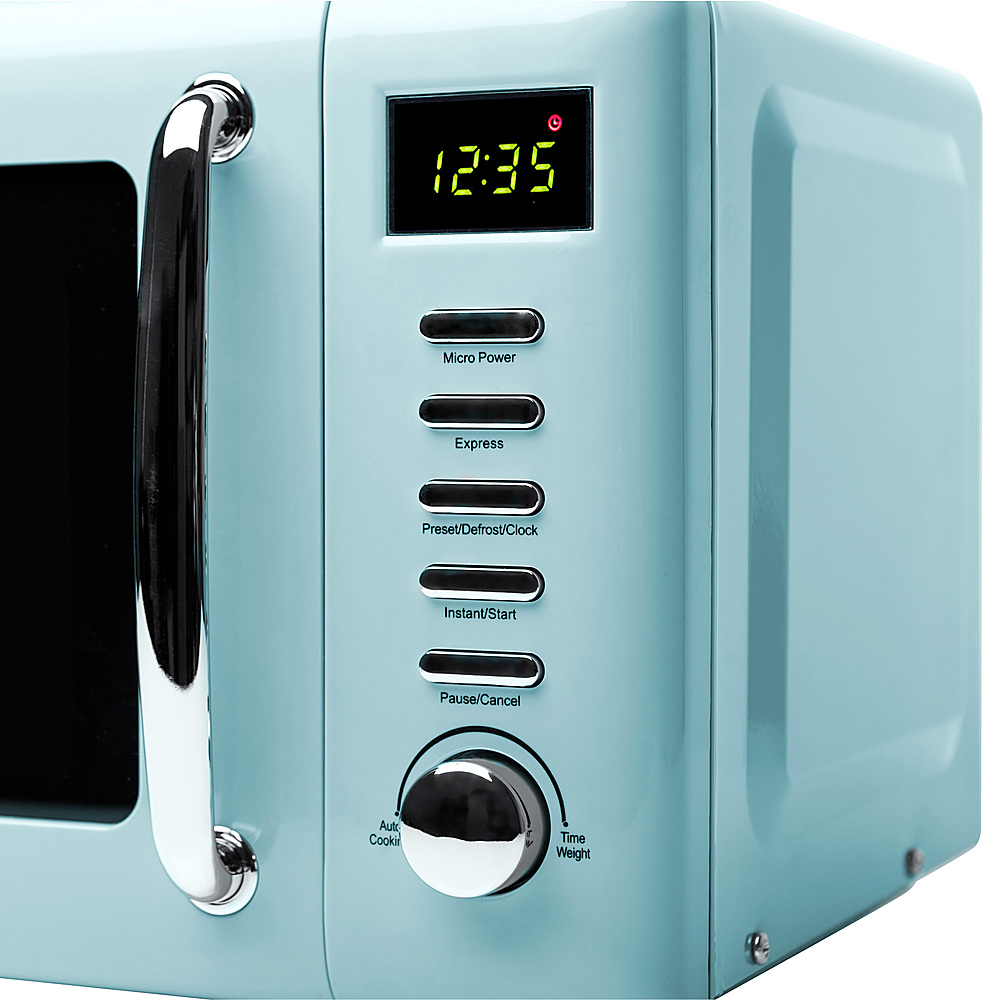 Mainstays 0.7 Cu ft Compact Countertop Microwave Oven, Teal, New