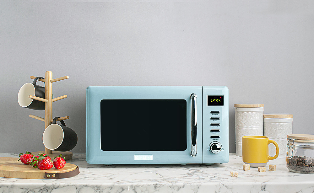 Left View: Haden - Heritage 700-Watt .7 cubic foot Microwave with Muliplte Settings and Timer - Turquoise