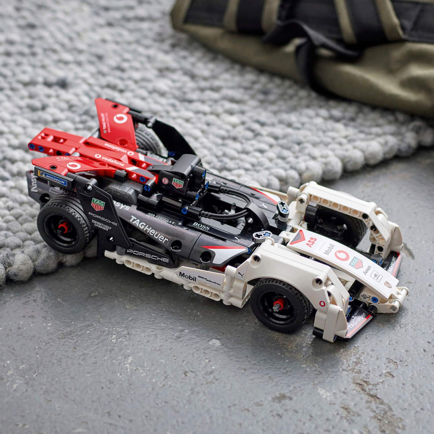 Left. LEGO - Technic Formula E Porsche 99X Electric 42137.