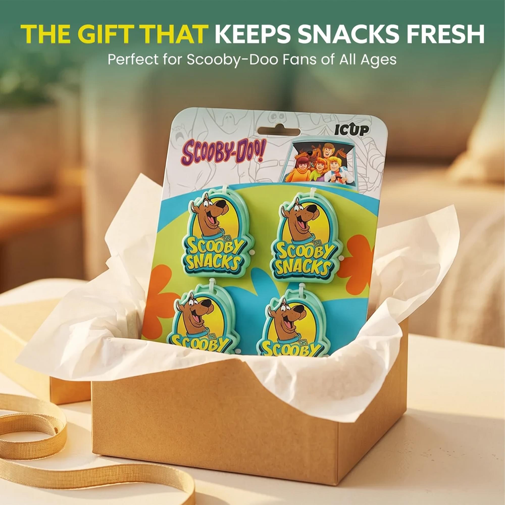THE GIFT THAT KEEPS SNACKS FRESH  
Perfect for Scooby-Doo Fans of All Ages  

SCOBY-DOO  
ICUP  
SCOOBY SNACKS  
SCOOBY SNACKS