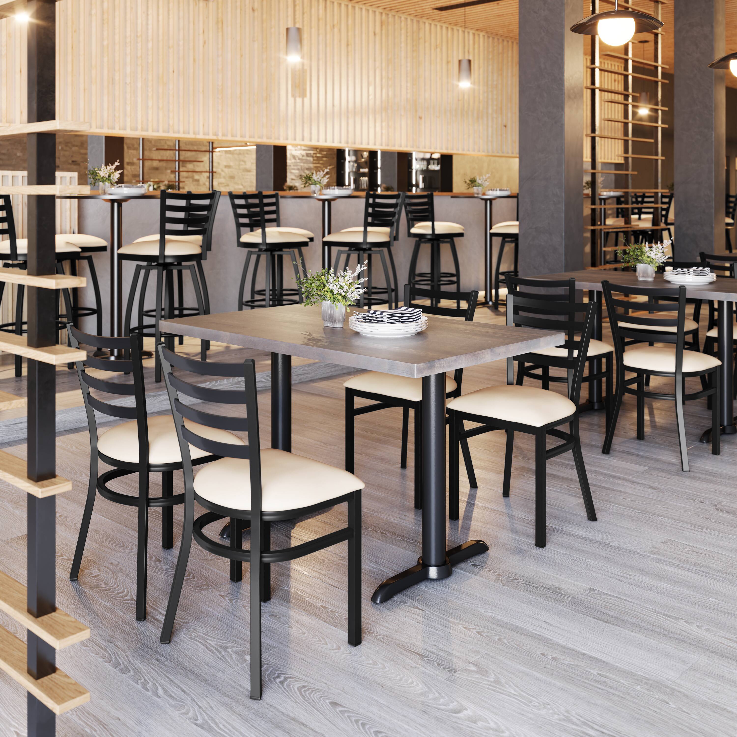 Alt View 2. Emma + Oliver - 4 Pack Ladder Back Metal Restaurant Chair - Upholstered Seat - Tan Vinyl Seat/Black Metal Frame.
