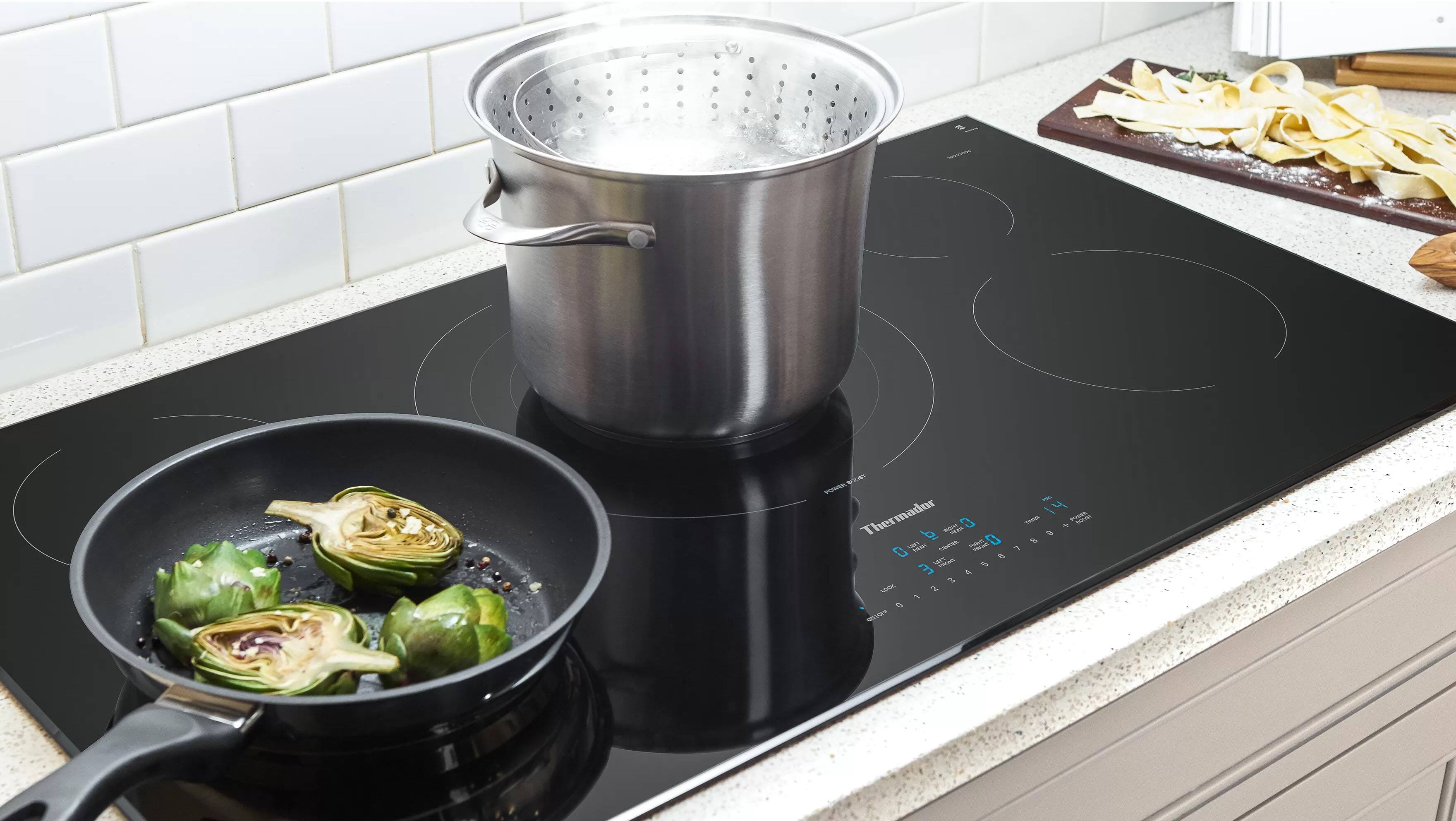 Alt View 17. Thermador - Masterpiece Series 36" Built-In Electric Induction Cooktop with 5 elements and Frameless Design - Black.