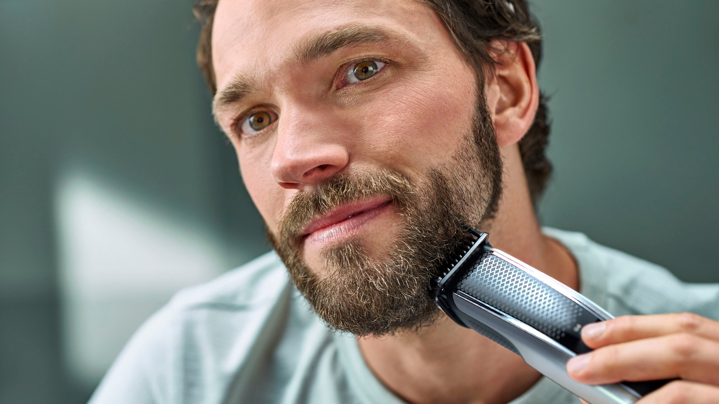 Left View: Philips Norelco Beard Trimmer and Hair Clipper Series 5000, BT5502/40 - Black And Silver