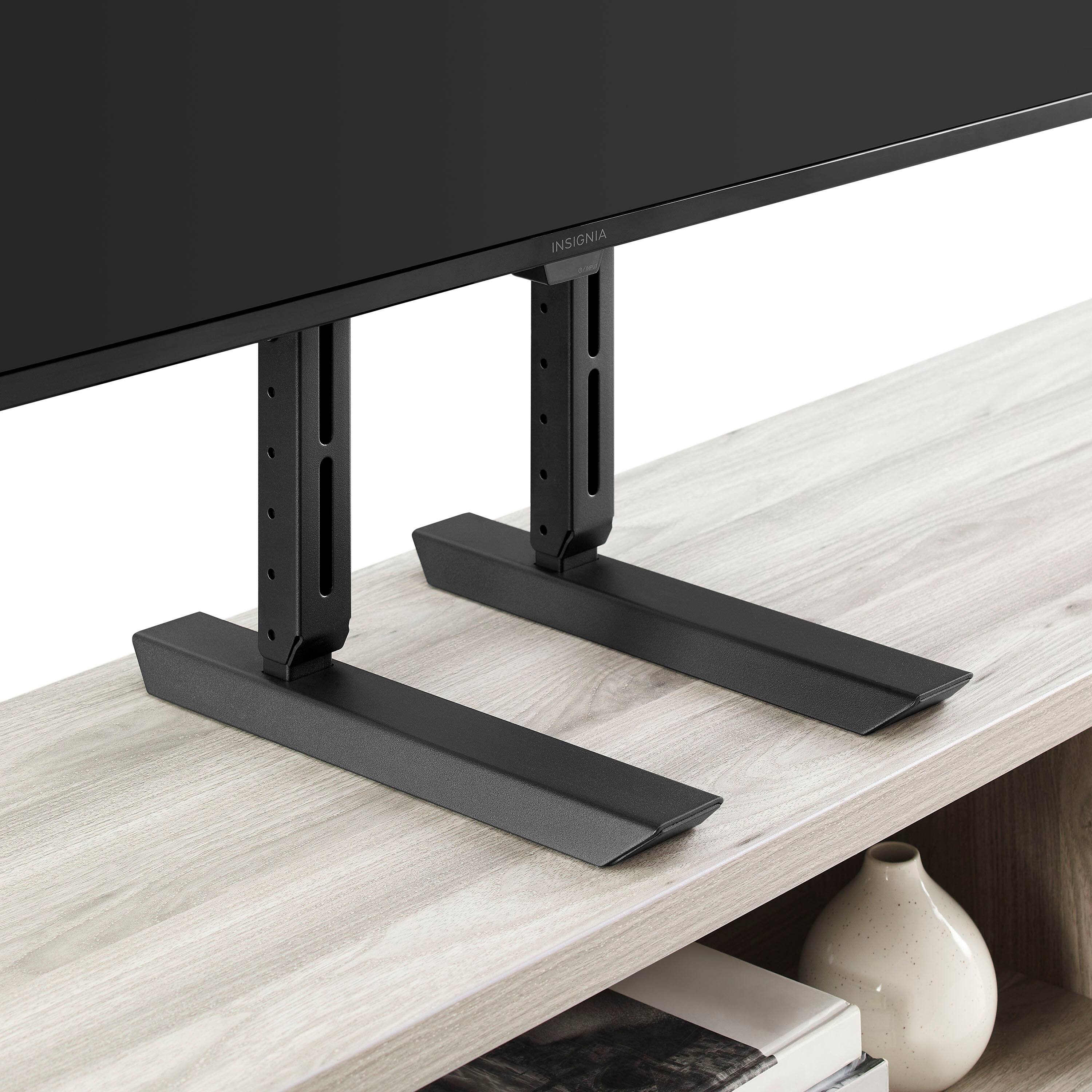 Left. Insignia™ - Universal TV Feet Replacement Kit for TVs 49"-77" or 100 lbs - Black.