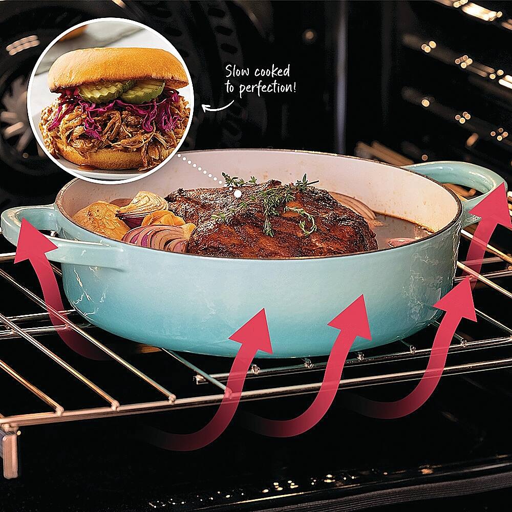 The image shows a blue pot filled with food, which is placed on a stove. The pot is filled with meat and vegetables, indicating that it has been slow cooked to perfection. The image also features a hamburger, which is placed next to the pot, suggesting that the meal is ready to be served. The pot is surrounded by red arrows, which might be used to emphasize the slow cooking process or to draw attention to the dish.