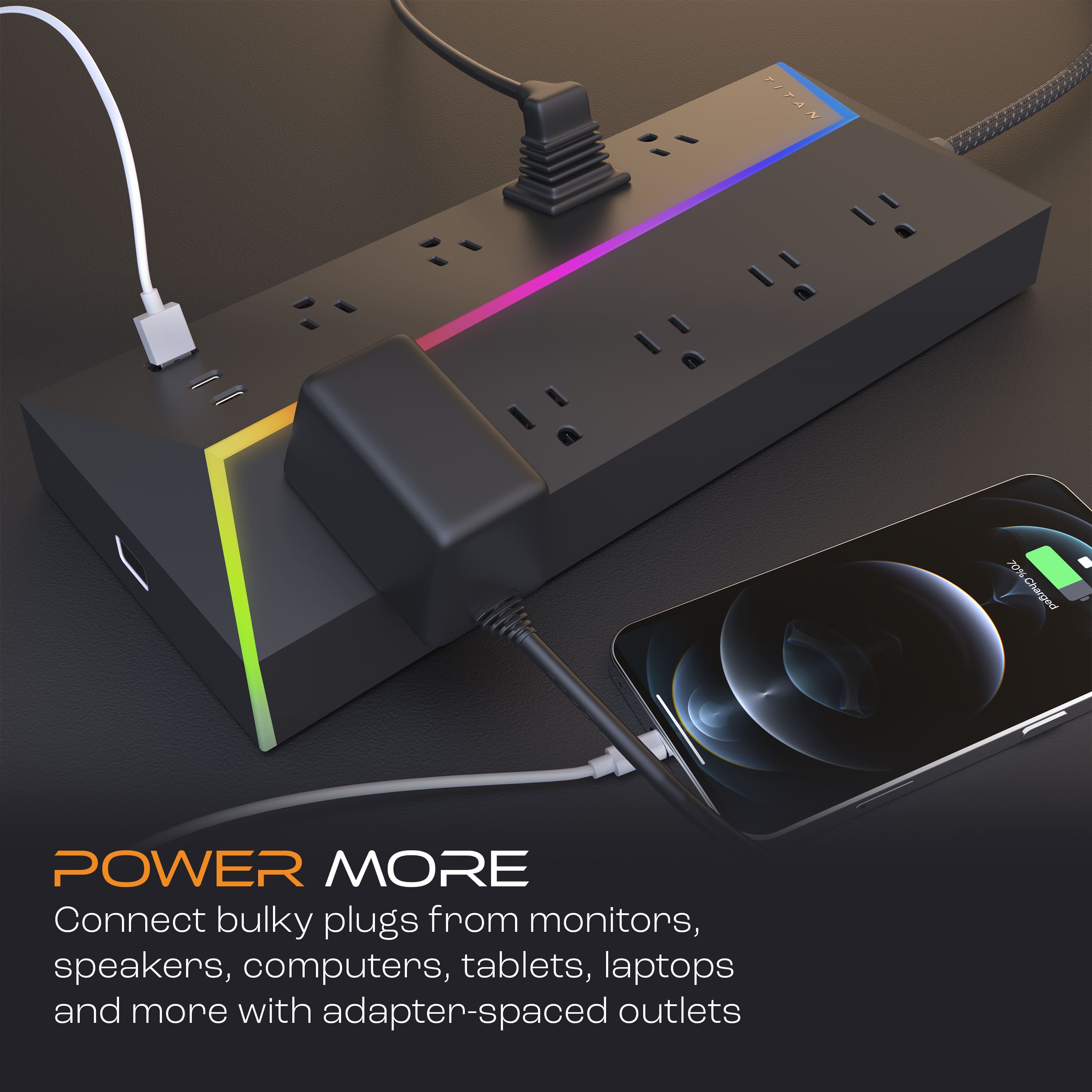 The text on the image reads: "Power More: Connect bulky plugs from monitors, speakers, computers, tablets, laptops and more with adapter-spaced outlets."