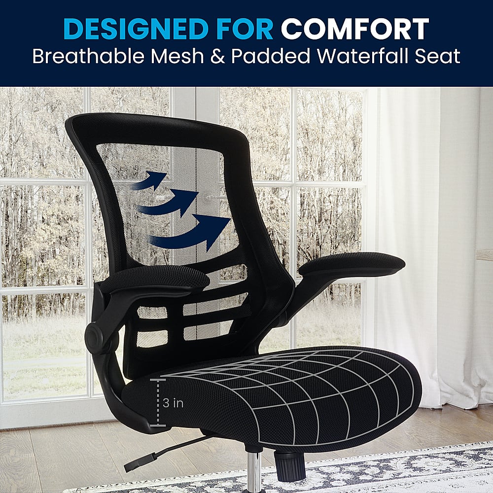 The image features a black office chair with a breathable mesh and padded waterfall seat. The chair is designed for comfort, providing a relaxing and supportive seating experience. The mesh material allows for better airflow, while the padded waterfall seat adds extra cushioning for added comfort. The chair is placed in front of a window, which allows natural light to enter the room and enhances the overall ambiance.