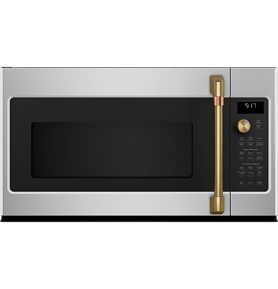 The image features a stainless steel oven with a black interior. The oven has a digital display, which shows the time of 9:31. The oven door is open, revealing the empty interior. The oven is equipped with a timer, which can be used to set the cooking time for various dishes.