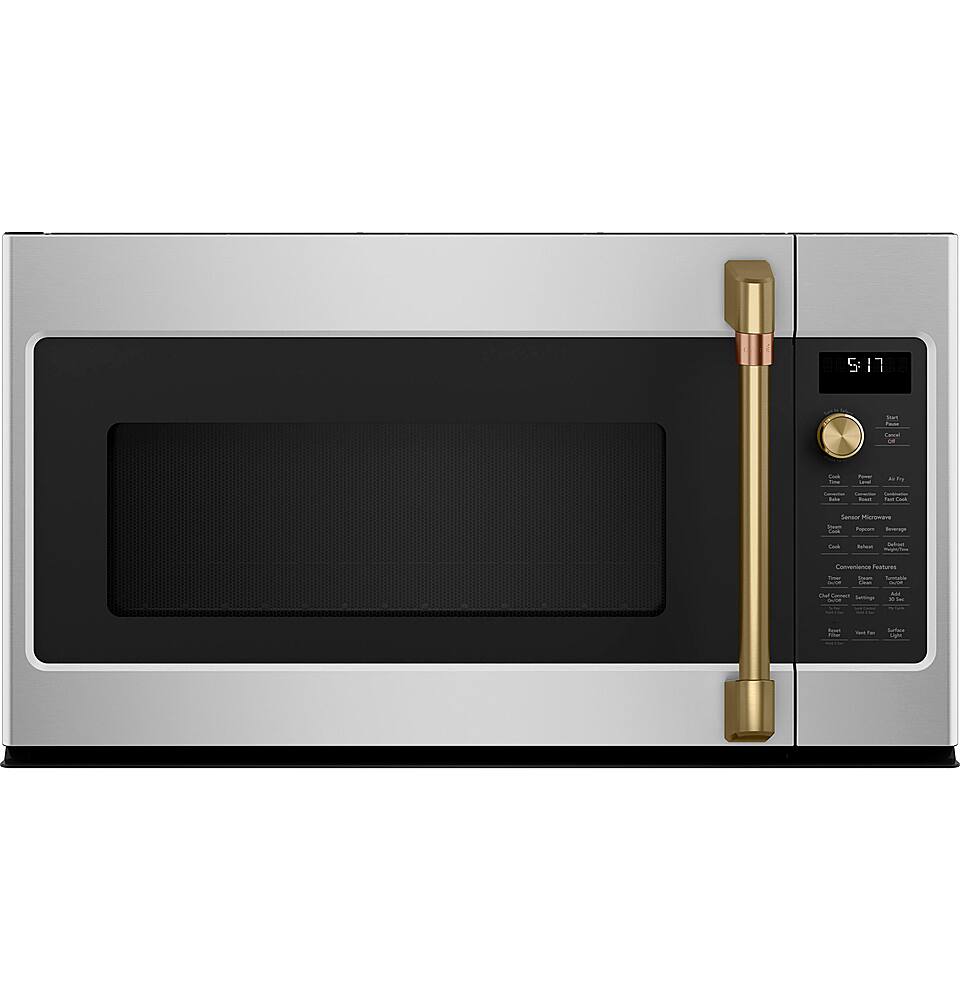The image features a stainless steel oven with a black interior. The oven has a digital display, which shows the time of 9:31. The oven door is open, revealing the empty interior. The oven is equipped with a timer, which can be used to set the cooking time for various dishes.