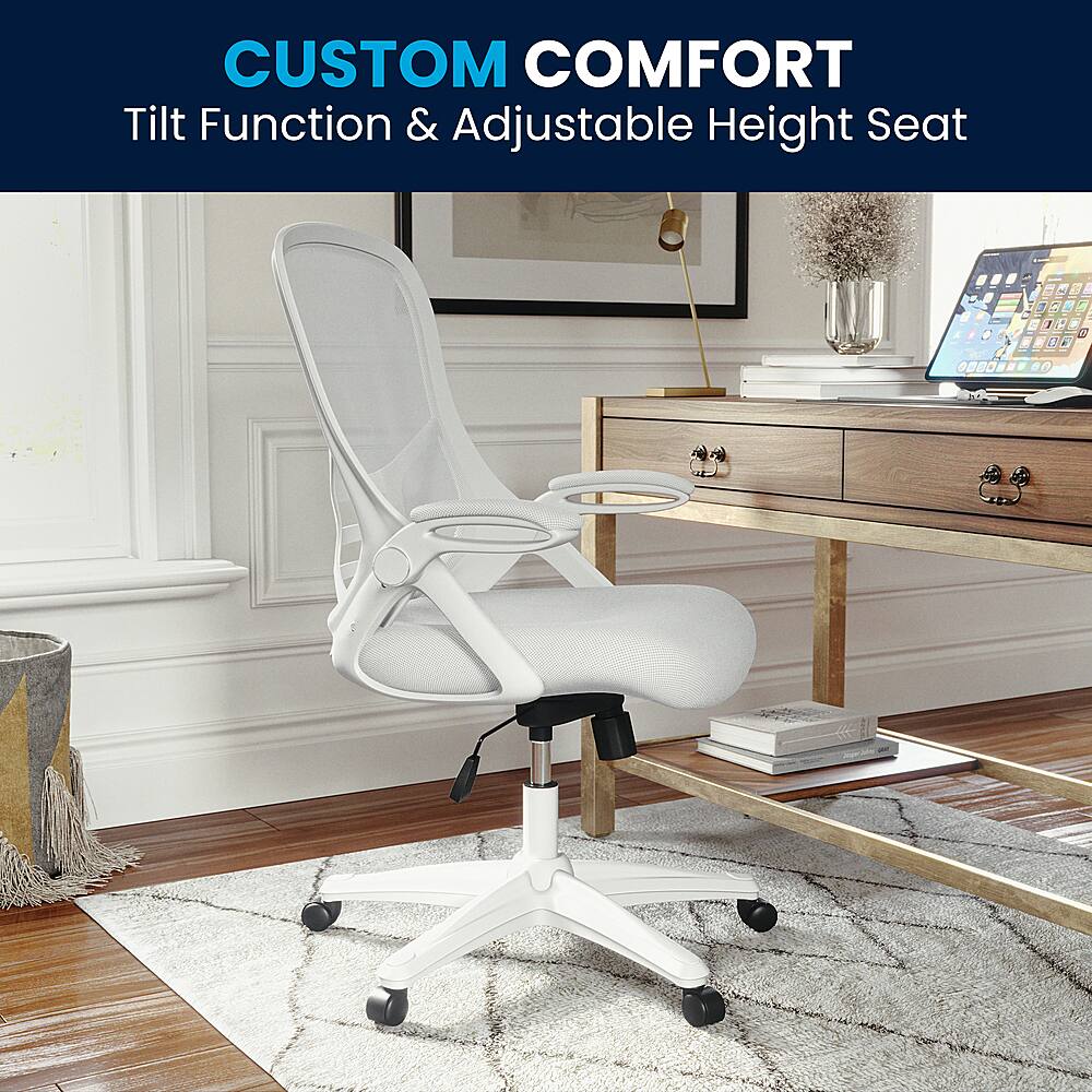 The image features a white office chair with a tilt function and adjustable height, placed on a wooden floor. The chair is positioned in front of a desk, which has a laptop and a keyboard on it. There are also several books scattered around the desk, indicating a workspace. Additionally, there is a vase on the desk, adding a decorative touch to the environment.
