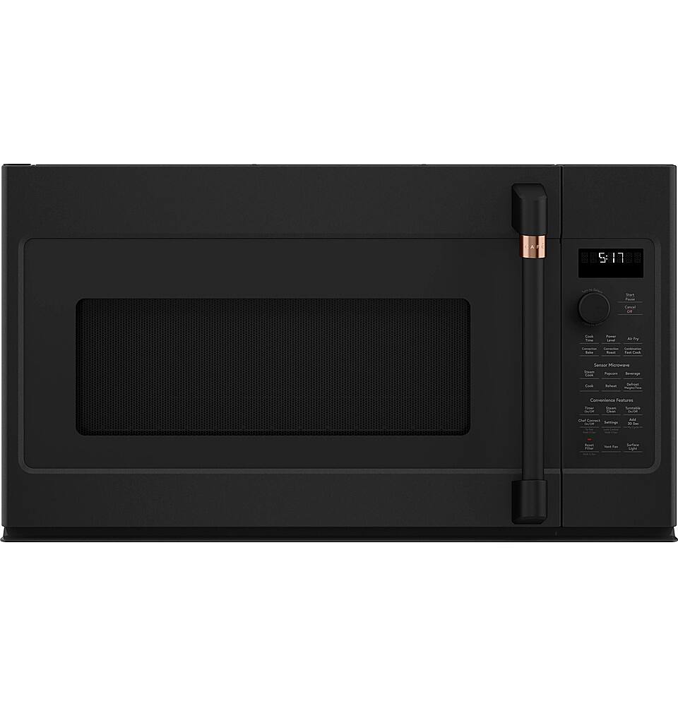 The image features a black microwave oven with a digital display. The display shows the time as 5:17.