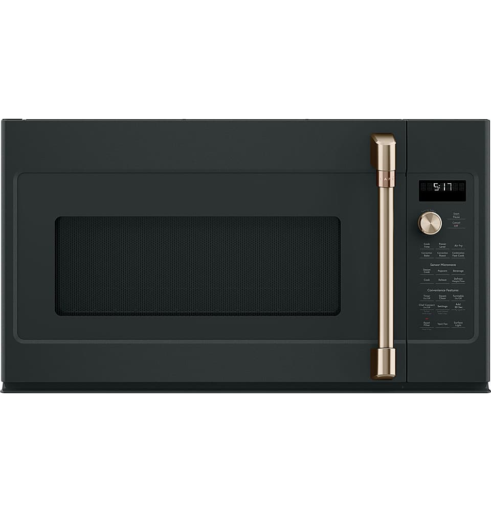 The image features a black oven with a gold handle. The oven has a digital display, which shows the time as 5:11. The oven appears to be empty, with no food or cooking items visible inside.