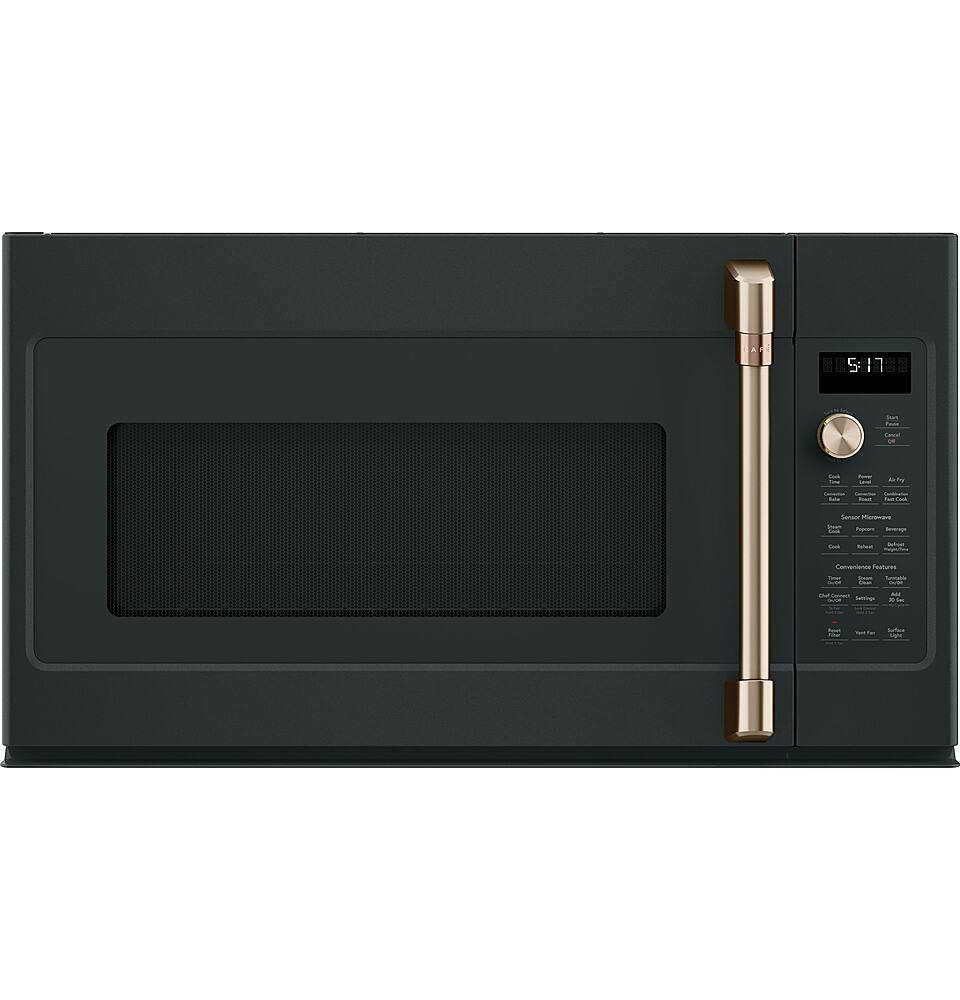 The image features a black oven with a gold handle. The oven has a digital display, which shows the time as 5:11. The oven appears to be empty, with no food or cooking items visible inside.