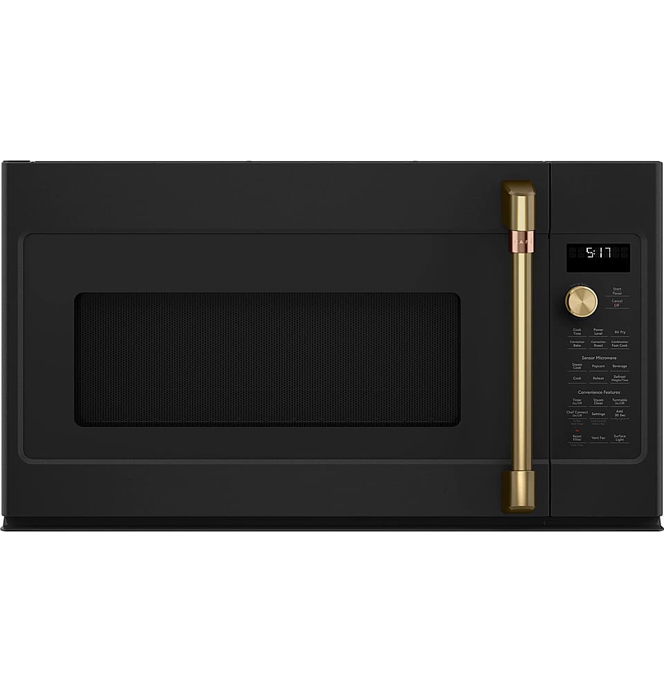 The image features a black oven with a gold handle. The oven has a digital display on the front, which shows the time as 5:17. The oven is empty, with no food or dishes visible inside.