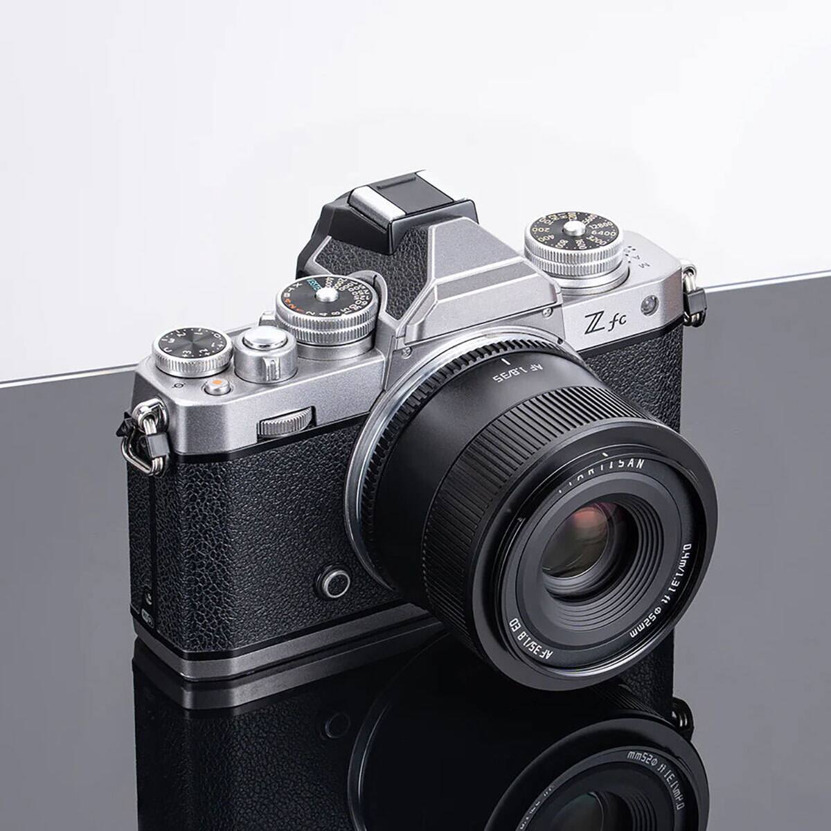 12800 200 64 400 BOO  
3 U  
+3  
~  
15  
I AF SE/B'I  
Zfc  
INDISAN ft 1319/040 ED AF35/1.8 52mm  
52mm ft TELDUP