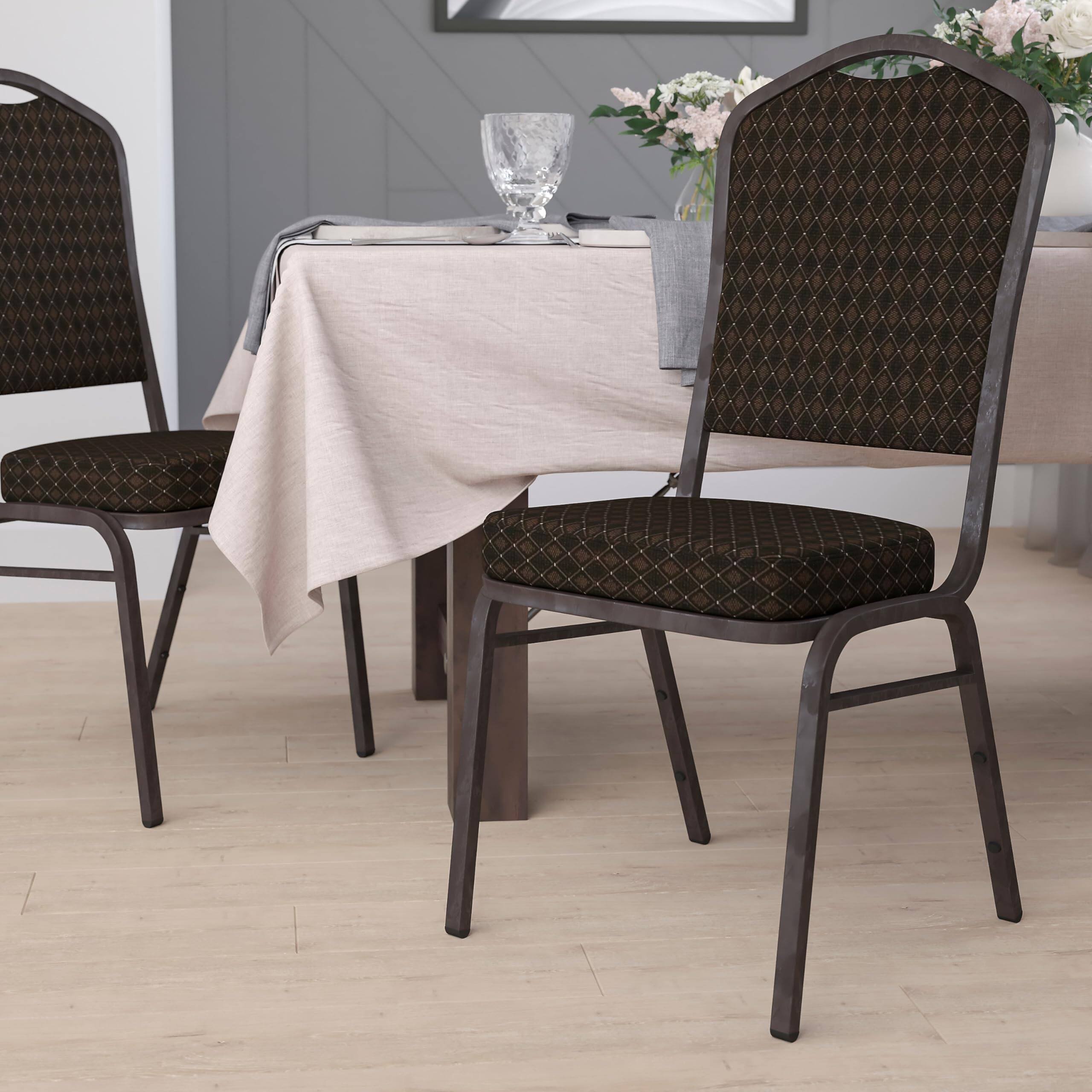 Angle. JETRANSPORT - Hercules Series Crown Stacking Banquet Chair In Brown Patterned Fabric - Vein Frame 100% - Brown Patterned Fabric/Gold Vein Frame Set.