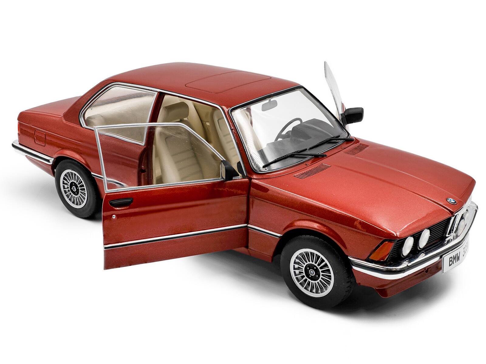Angle. Solido - 1980 BMW 323i Ruby Red Metallic 1/18 Diecast Model Car by Solido - Ruby Red Metallic.