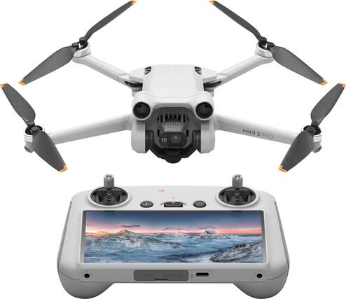 The image features a white drone with a screen attached to it. The drone is equipped with a camera and has a remote control for operation. The screen displays a beautiful mountain scene, adding to the overall aesthetic of the drone. The drone is likely designed for aerial photography and videography, providing users with a unique perspective of the surroundings.