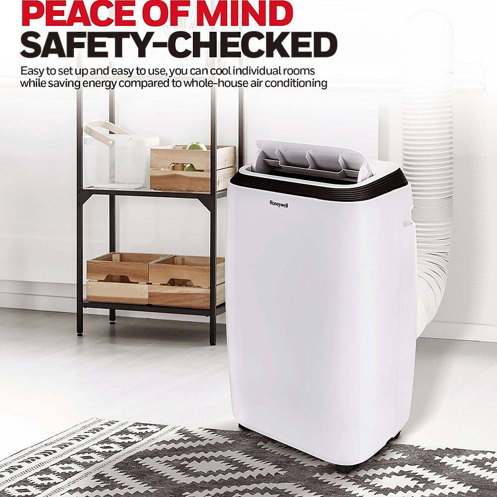 The text on the image reads: "PEACE OF MIND SAFETY-CHECKED Easy to set up and easy to use, you can cool individual rooms while saving energy compared to whole-house air conditioning Honeywell." This text is grouped and corrected as follows:

"Peace of Mind Safety-Checked: Easy to set up and easy to use, you can cool individual rooms while saving energy compared to whole-house air conditioning. Honeywell."