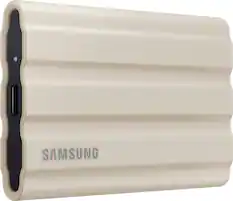 Front. Samsung - T7 Shield 1TB External USB 3.2 Gen 2 Rugged SSD IP65 Water Resistant - Beige.