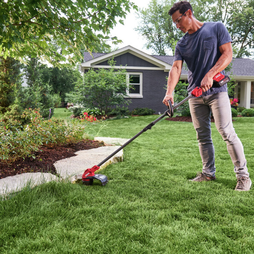 Left View: WORX - 20V Power Share Cordless 22" Hedge Trimmer - Black