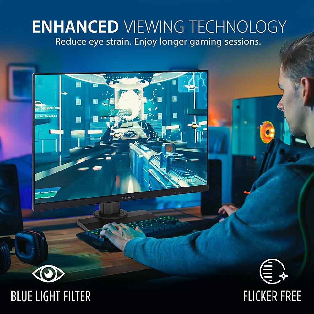 The image features a man sitting at a desk, using a computer with a large monitor. He is typing on a keyboard, which is placed in front of the monitor. The man is focused on the screen, possibly enjoying a video game or working on a project. The image highlights the benefits of enhanced viewing technology, such as reduced eye strain and longer gaming sessions. Additionally, the monitor is equipped with a blue light filter and flicker-free technology, which can help protect the user's eyes and improve overall viewing experience.