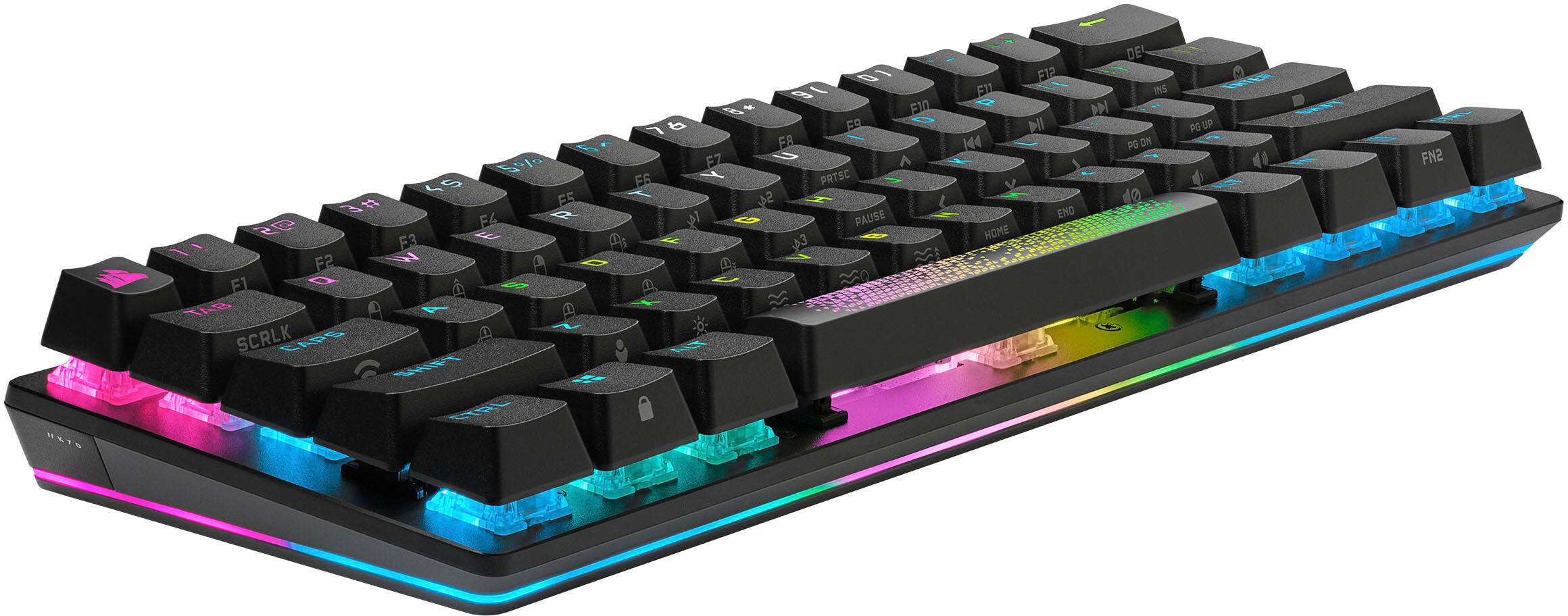 Left. CORSAIR - K70 Pro Mini Wireless 60% RGB Mechanical Cherry MX SPEED Linear Switch Gaming Keyboard with swappable MX switches - Black.