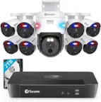 The image features a Swann security camera system with a total of 12 cameras, including a 2TB hard drive. The cameras are mounted on a white box and are positioned at various angles, providing a comprehensive view of the area they are monitoring. The system is designed to offer high-quality surveillance and security for homes and businesses.