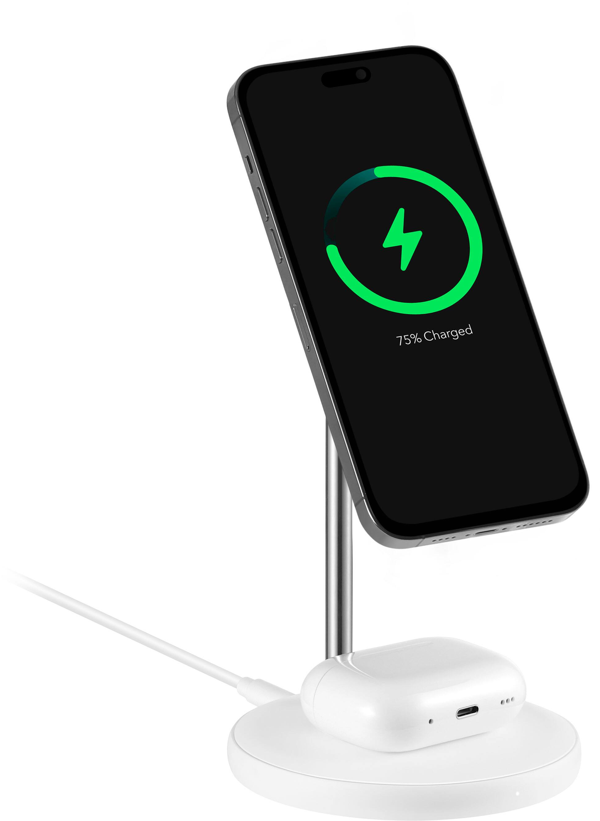The image shows a cell phone that is 75% charged. The phone is placed on a stand, which is connected to a charger. The charger is plugged into an outlet, ensuring that the phone stays charged and ready for use.