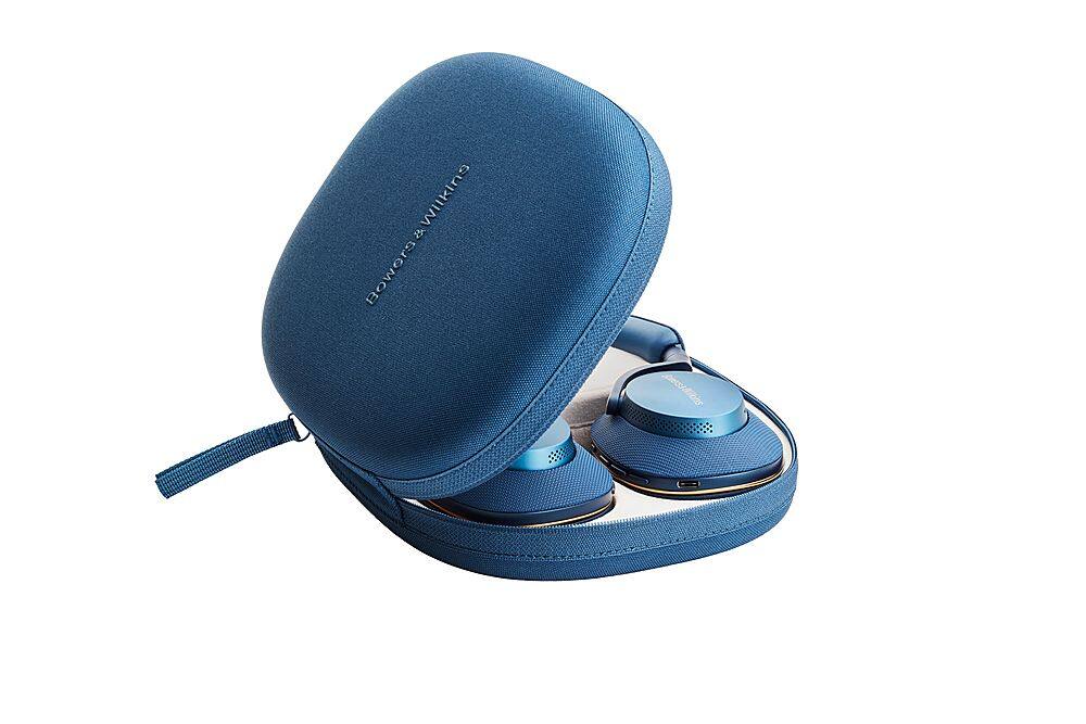 The image shows a blue case with a pair of earbuds inside. The case is designed to hold the earbuds securely and protect them from damage. The earbuds are blue and can be used for listening to music or making phone calls. The case is a convenient way to keep the earbuds organized and easily accessible when not in use.