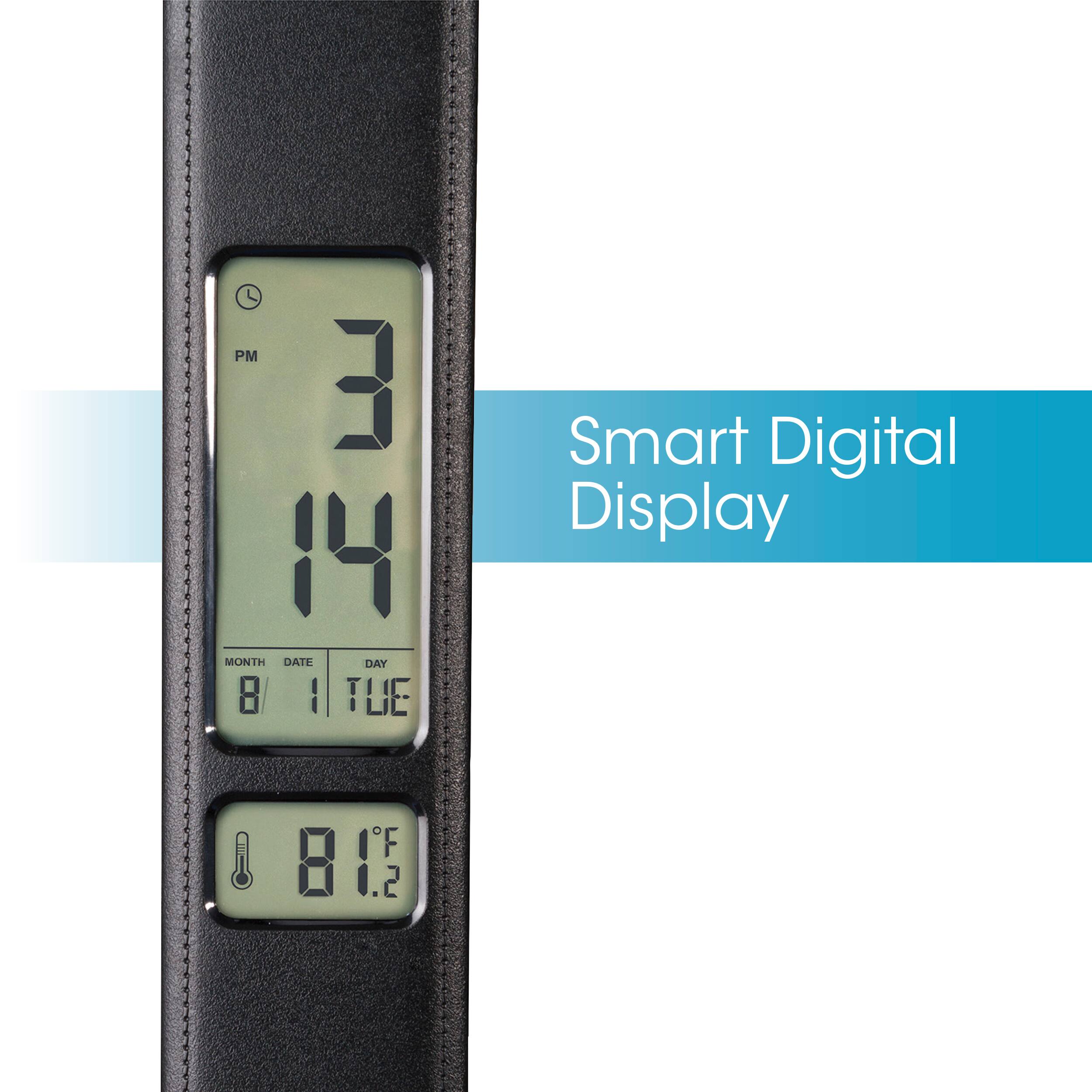 The image shows a black smart digital display with the time of 3:34 displayed. The display also shows the date, which is the 14th of the month. The temperature is 81 degrees Fahrenheit, and the day is Tuesday.