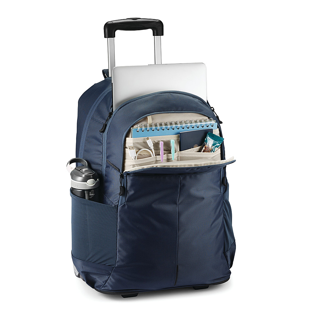 Left View: High Sierra - Powerglide Pro Wheeled Backpack for 15.6" Laptop - Indigo Blue