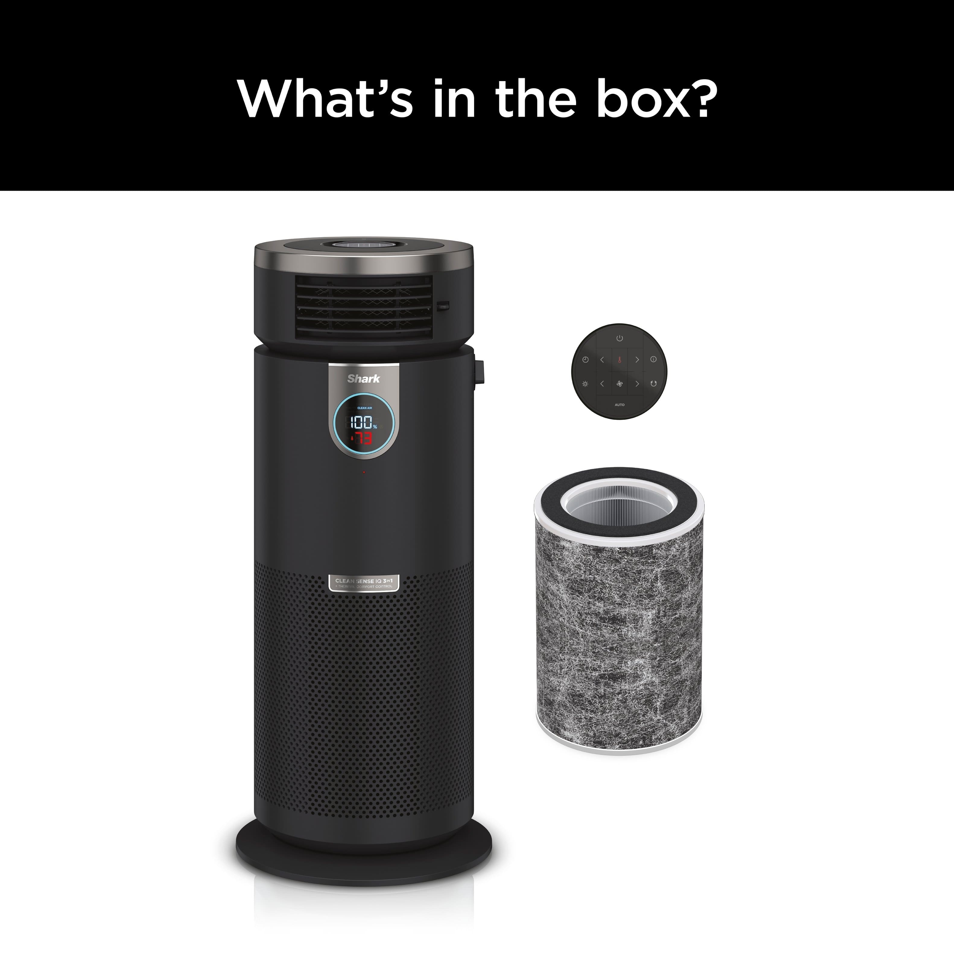 The image features a black Shark IQ robot vacuum cleaner sitting on a white background. The vacuum cleaner is accompanied by a small black and grey accessory, which appears to be a filter. The image does not show any box or additional information about the contents of the box.