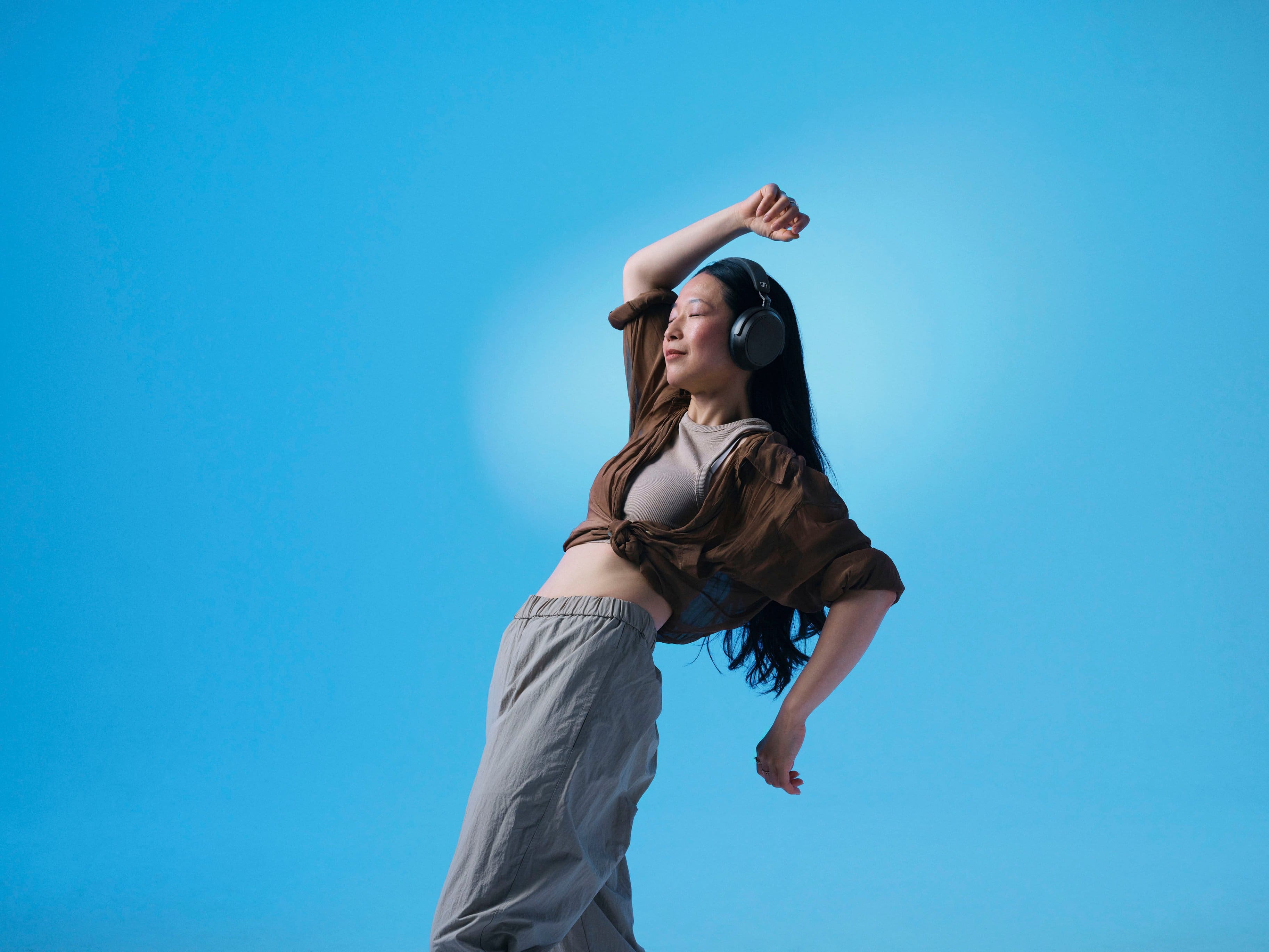 Alt View 23. Sennheiser - Momentum 4 Wireless Adaptive Noise-Canceling Over-The-Ear Headphones - Black.