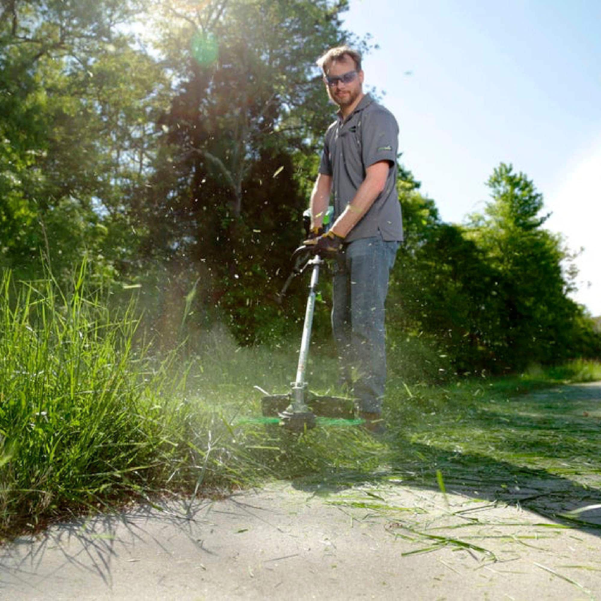 Alt View 15. Greenworks - 80 Volt 16-Inch Cutting Diameter Straight Shaft Grass Trimmer and Axial Blower (1 x 2.0Ah Battery and 1 x Charger) - Green.