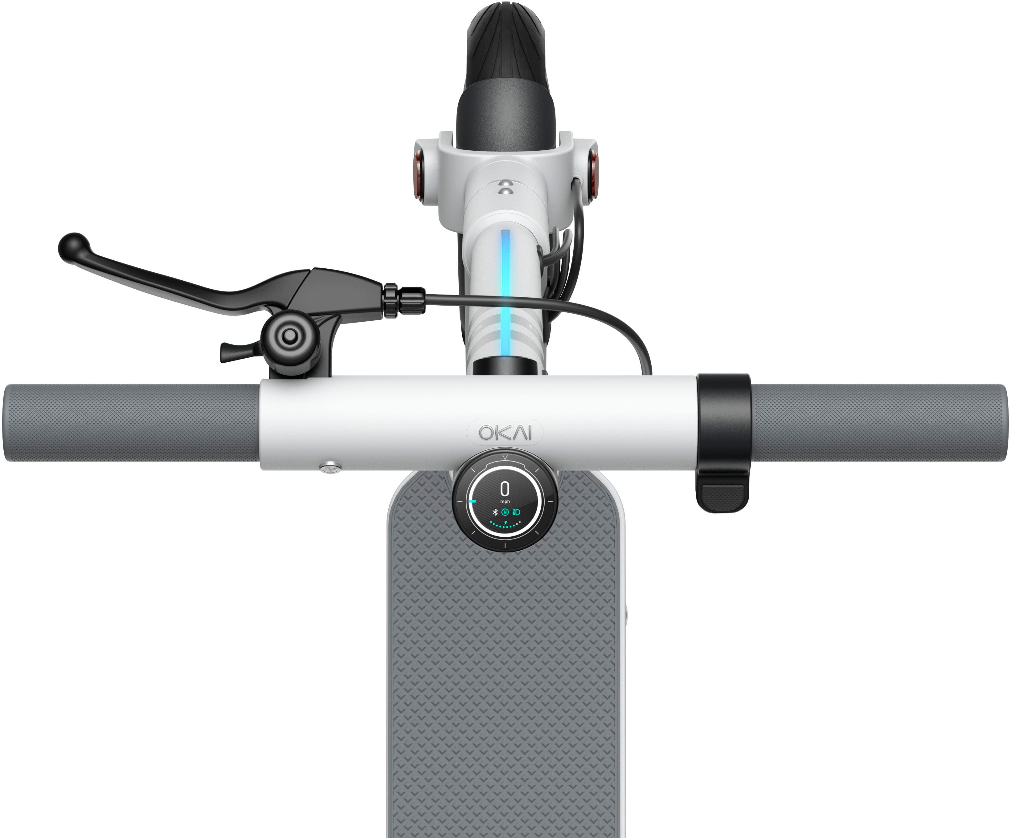 The image features a white and black scooter with a handlebar attached to it. The scooter is equipped with a cell phone holder and a control panel, which includes a speedometer and a button. The scooter is designed to be used with a cell phone, providing a convenient way to keep the device within reach while riding.