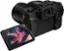 Left. Panasonic - LUMIX G95 Mirrorless 4K Camera with 12-60mm F3.5-5.6 Micro Four Thirds Lens - Black.