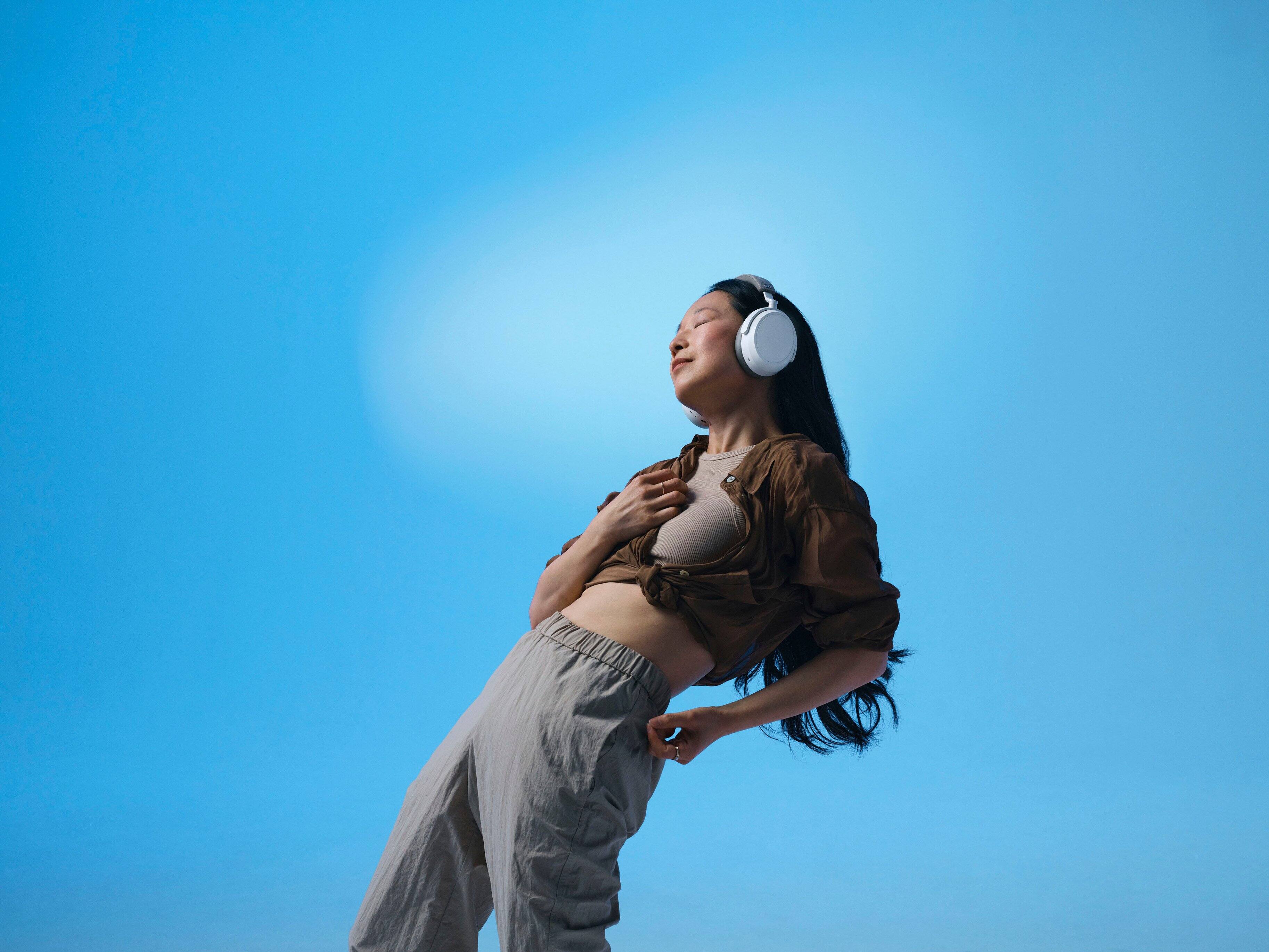 Alt View 21. Sennheiser - Momentum 4 Wireless Adaptive Noise-Canceling Over-The-Ear Headphones - White.