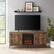 Alt View 11. Walker Edison - Modern Farmhouse Barn Door Fireplace TV Stand for Most TVs up to 65” - Rustic Oak.