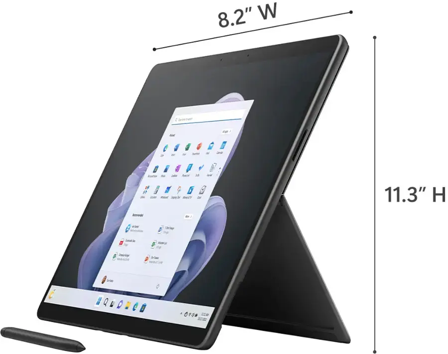 The image features a tablet computer with a large screen. The tablet is 8.2" wide and 11.3" high, as indicated by the ruler in the image. The tablet is on display, possibly in a store or at an event.