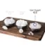 The image features a wooden tray with three bowls of ice, each containing different types of ice. The largest text reads "Crescent Gourmet ICE," while the other two bowls are labeled "Gourmet ICE" and "Opal Nugget ICE." The ice in the bowls is of various sizes and shapes, showcasing the different types available for consumption.